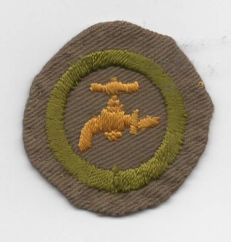 Plumbing Merit Badge, Type B Tan Wide Crimped (1934-35), Used