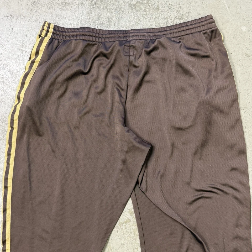 Pantalones deportivos Adidas vintage forrados de lana con cremallera al tobillo para hombre XL nailon marrón amarillo Foto 4 de 4