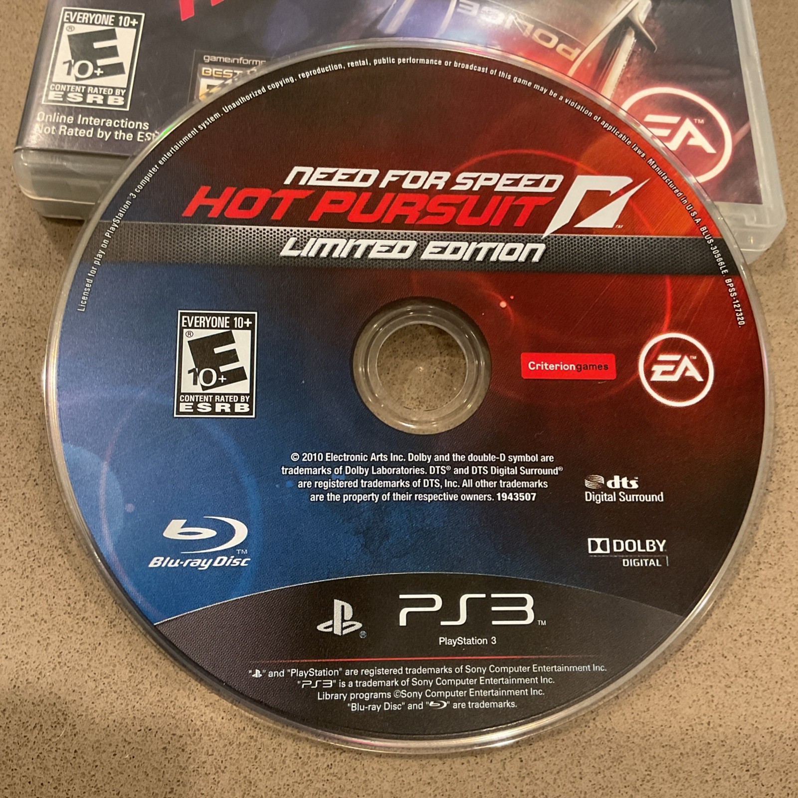 PS3 Need for Speed Most Wanted Hot Pursuit Rivals Limited Edition case with red and blue artwork and EA logo on disc.