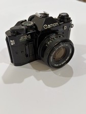 Canon AE-1 Program Black 35mm SLR Film Camera w/ 50mm f/1.8 FD Lens - Tested 