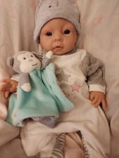 Très beau poupon d'un peu moins de 50cm  