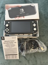 CONSOLE NINTENDO SWITCH LITE EN BOÎTE COMPLÈTE - HS SUITE À UNE RÉINISILATION ??