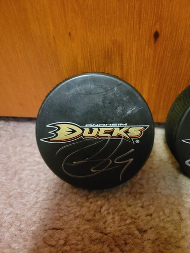 NHL Anaheim Ducks Ryan Getzlaf, Bobby Ryan Signed Autographed Hockey Pucks - Picture 3 of 4