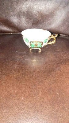 Weird Green cat teacup