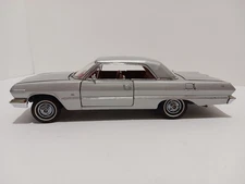 1:24 1963 IMPALA SS in Satin Silver Poly, Red Interior, MADE by FRANKLIN MINT