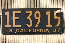 California 1937 License Plate 1E3915 Black Yellow Collectible