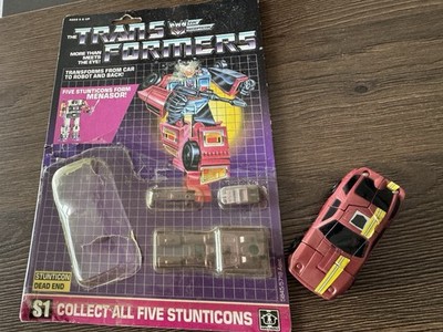 Transformers G1 Stunticon Dead End mit Cardback & Bubble und Zubehör
