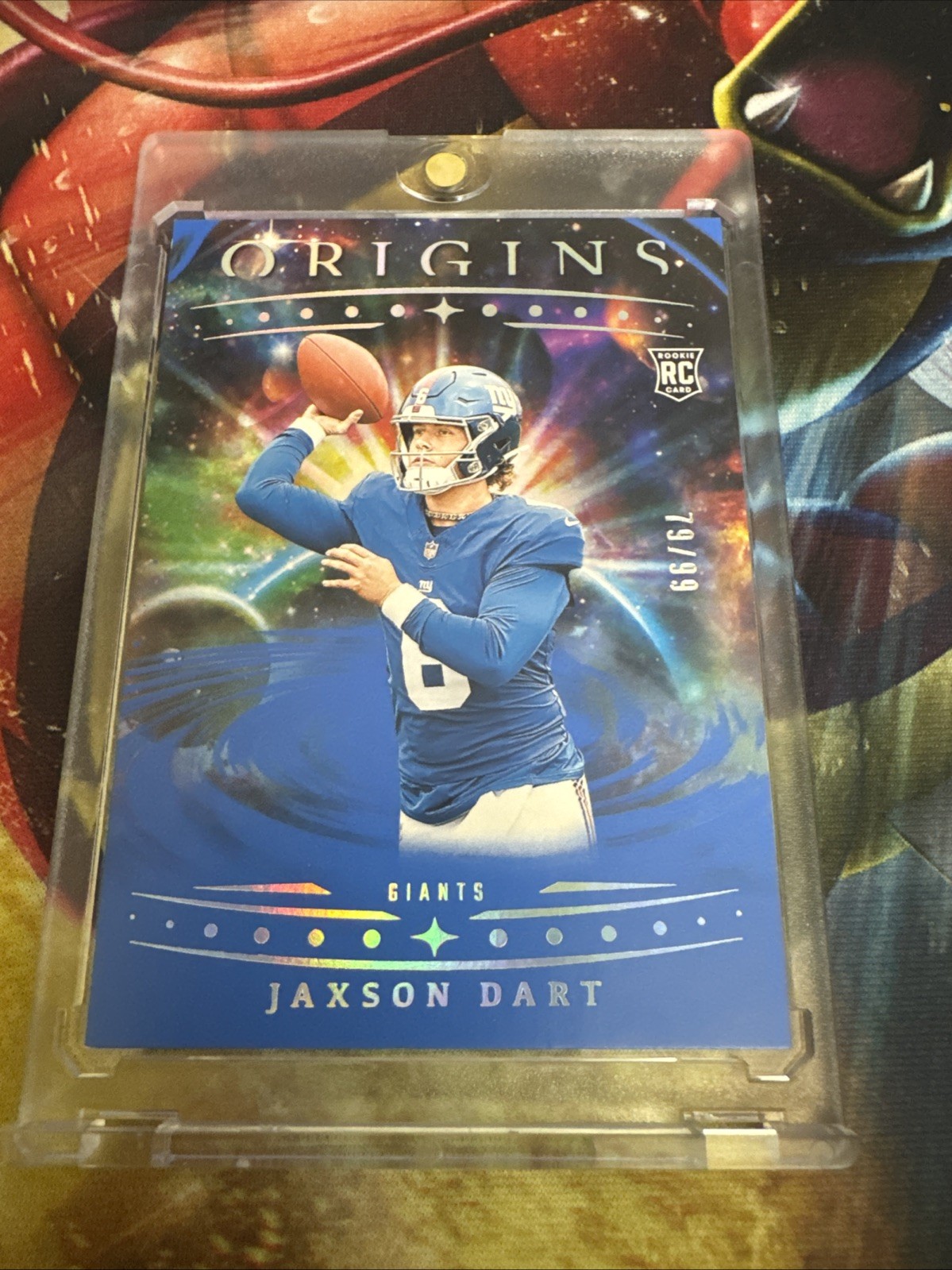 2025 Panini Origins - Rookies Jaxson Dart, Jaxson Dart #145 Blue /99 (RC)