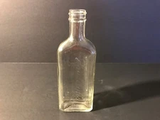 RAWLEIGH'S Medicine Bottle USA Clear Glass Vintage Embossed Advertising