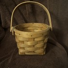 1990 Longaberger Basket, round top, square bottom, rotating handle — photo 1
