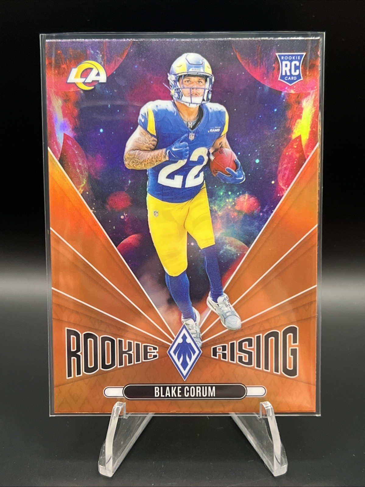2024 Panini Phoenix Blake Corum Orange Rookie Rising #RR-BCM