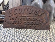 Antique Cast Iron Economy Furnace Plate Sign International Heater Utica New York
