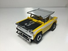 AFX BRONCO body YELLOW  Auto-World Ultra G chassis BRAND NEW  COLLECTOR GRADE
