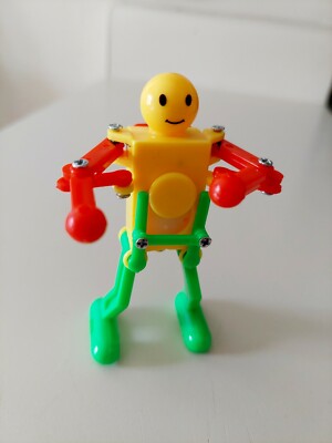 3.5'' Fun Wind-up Dancing Robot Toy Red Green and Yellow. Makes a great holiday C