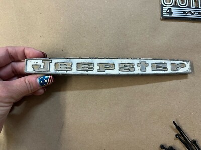 1966-1971 JEEPSTER COMMANDO HOOD EMBLEM 66-71 OEM