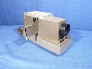 BELL & HOWELL 707 HEADLINER SLIDE PROJECTOR..1940'S