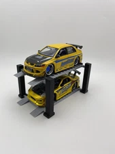 CARS INCLUDED* 1:64 Scale Diecast 4 Post Lift Display 2 tier