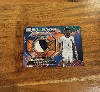 Bukayo Saka 2024-25 Panini Obsidian Galaxy Taiga /25 Patch Jersey