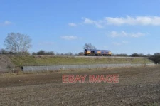 PHOTO  LIGHT ENGINE MOVEMENT GREAT BRITISH RAIL FREIGHT CLASS 66 66731 RUNS ON A