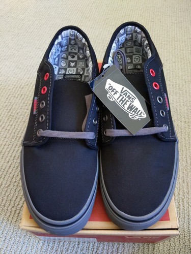 vans black sole slip on