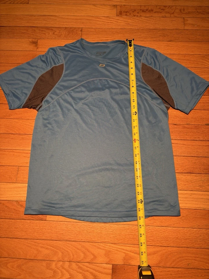 Camiseta deportiva grande azul Sugoi para correr ciclismo manga corta ropa activa Foto 3 de 4