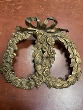 Antico fregio fermacarte Impero in bronzo con nodo d'amore 