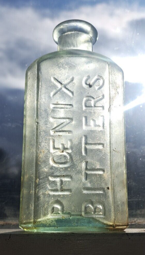 Phoenix Bitters John Moffat Price $1.00 snap mold Bottle 5.5 inches