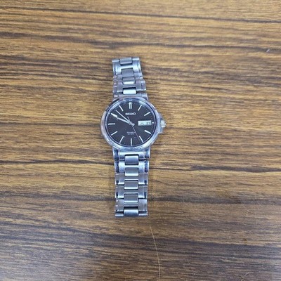 SEIKO TMI Black Titanium Watch Date Feature Lightweight Durable Everyday