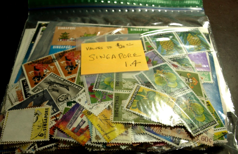 1.4 OUNCES SINAPORE STAMPS OFF PAPER UNCHECKED