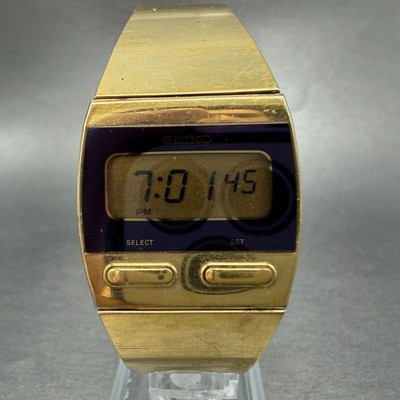 Seiko Digital Watch Men 28mm LCD Gold Tone Daydate F231-4009 Rectangle New Batt
