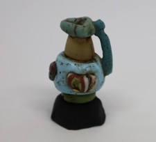 ancient roman face glass bead