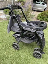 Chicco pram with two isofix bases. Black and grey