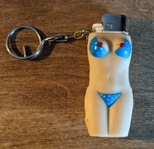 Vintage Taiyo disposable lighter woman shape key holder