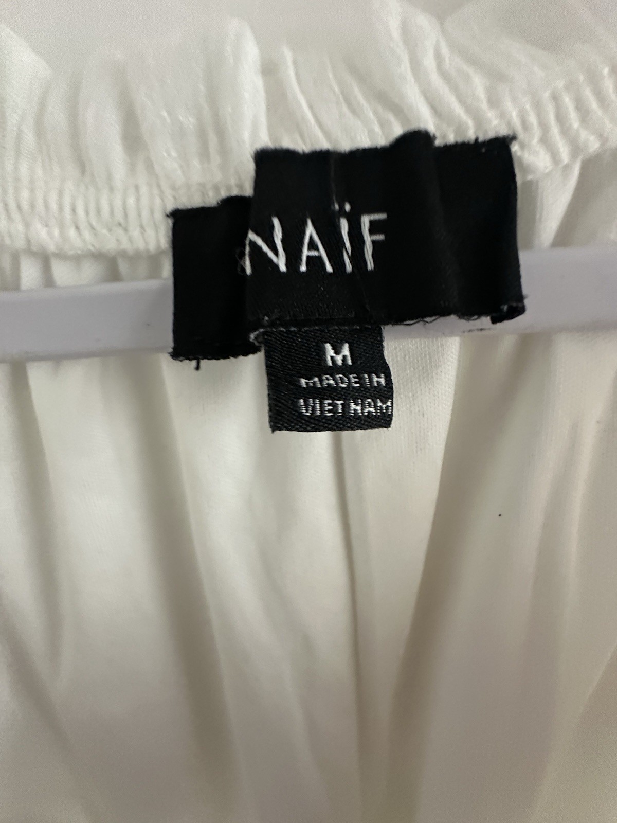 Naif Dress M  White Lined Dress Tasseled Neckline Short Sleeve 