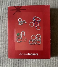 Lot Of 4 Brain Teaser Steel Puzzles 2003 Target Brand In Box