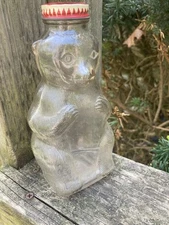 Vintage Snow Crest Beverages Clear Glass Bear Coin Bank with Slot Metal Lid