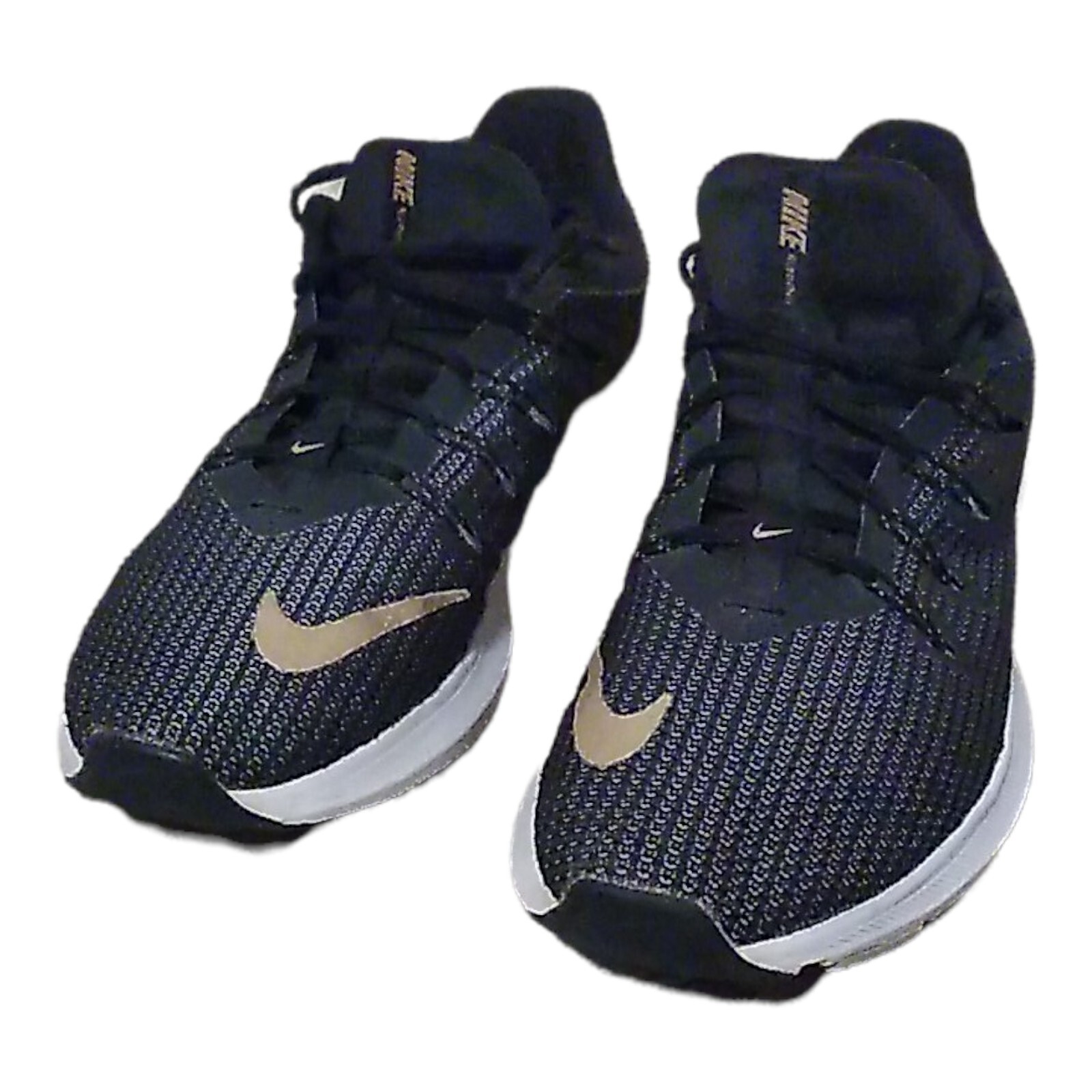 nike black and gold tennis shoes