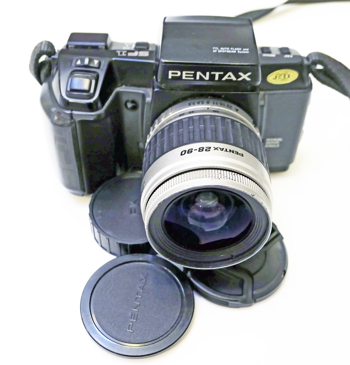 Pentax SF1 w/ 28-90mm SMC Pentax FA F3.5 zoom, caps, new