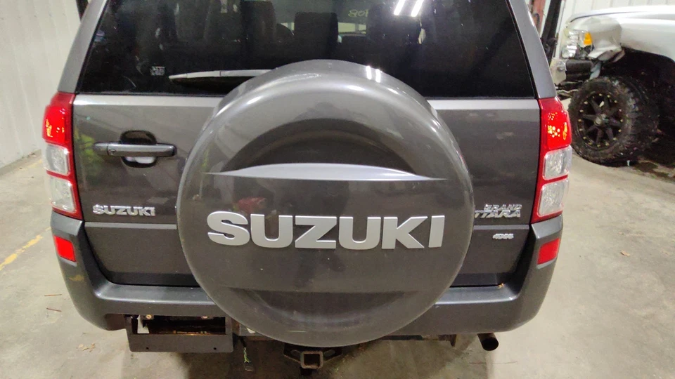 06-13 Cubierta rígida para neumático de repuesto Suzuki Grand Vitara (gris azul) 72821-65JT0-A Foto 2 de 4