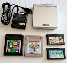 NINTENDO GAMEBOY ADVANCE SP PLATINUM HANDHELD W CHARGER AND GAMES