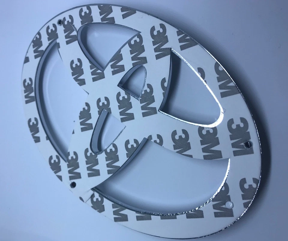 EMBLEMAS PARRILLA DELANTERA TOYOTA LAND CRUISER OEM MODELOS 2005-2014 90975-02076 Foto 2 de 2