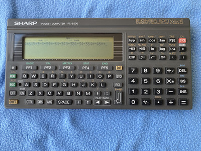 SHARP PC-E500 Taschencomputer Pocket Computer 1990 mit Handbuch