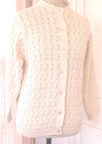 White cotton knit women's long sleeve sweater with scalloped lace pattern, button front, and two front pockets made in USA.