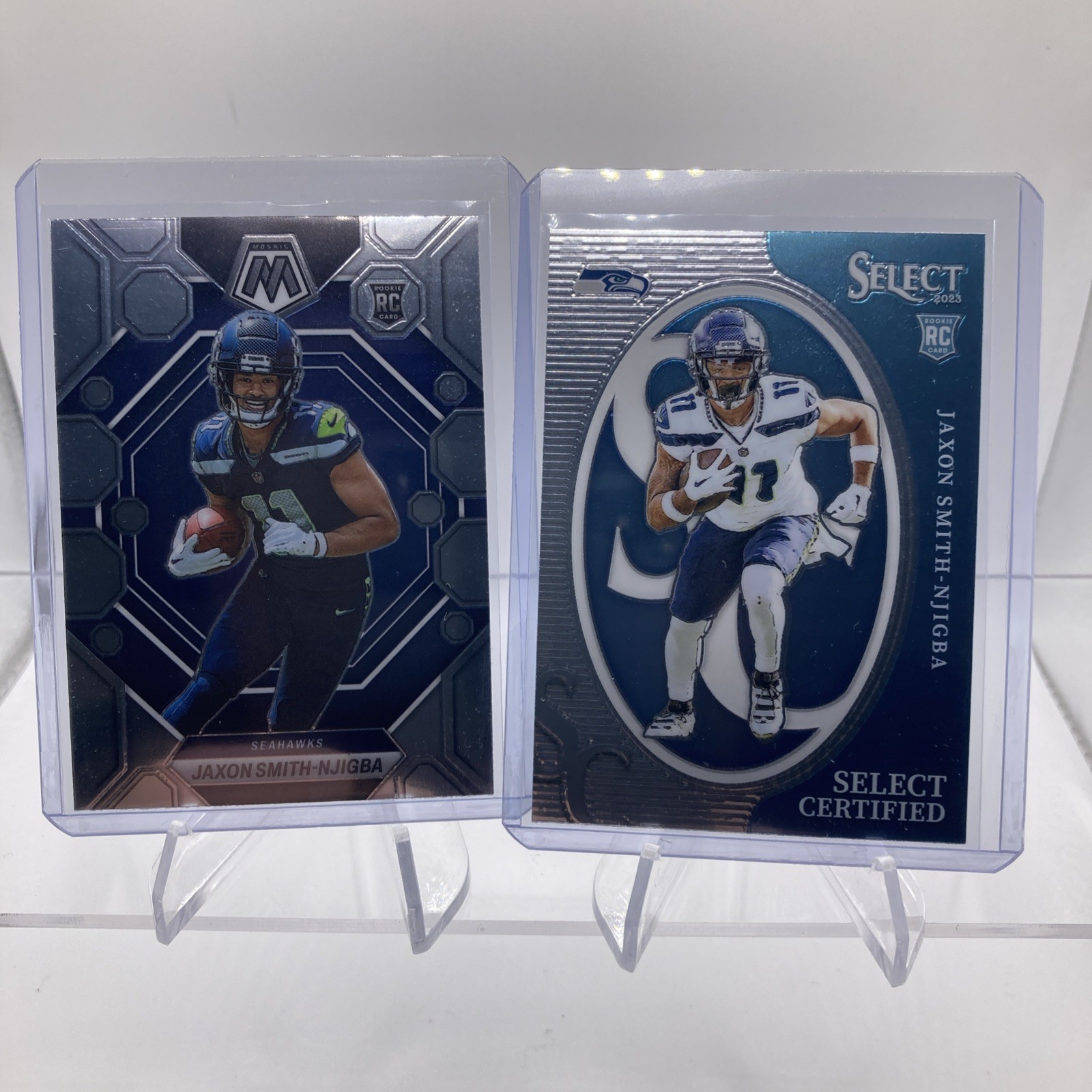 2023 Mosaic Jaxon Smith-Njigba Base Silver Rookie RC #331 Seahawks & #CRO-JSN RC