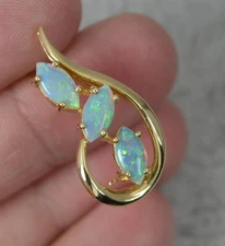 Colourful Natural Opal and 14 Carat Gold Brooch