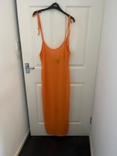 Orange dress from prettyLittle thing. Size 12, worn and in very good condition.
