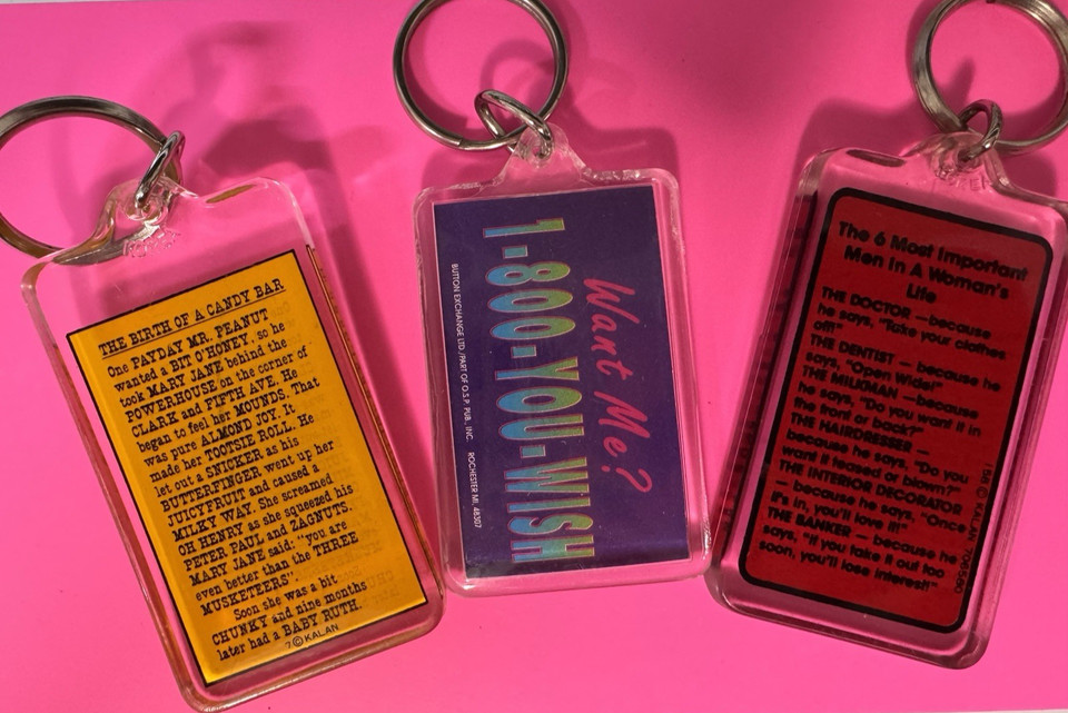 Deadpan sarcastic Lucite keychains from Kalan — a forgotten brand of gloriously passive-aggressive pocket humor from the '70s–'80s.