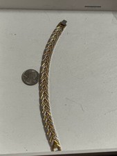 Magnet bracelet in silver and gold tone