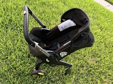 Doona Black Single Folding Infant Stroller Transforming
