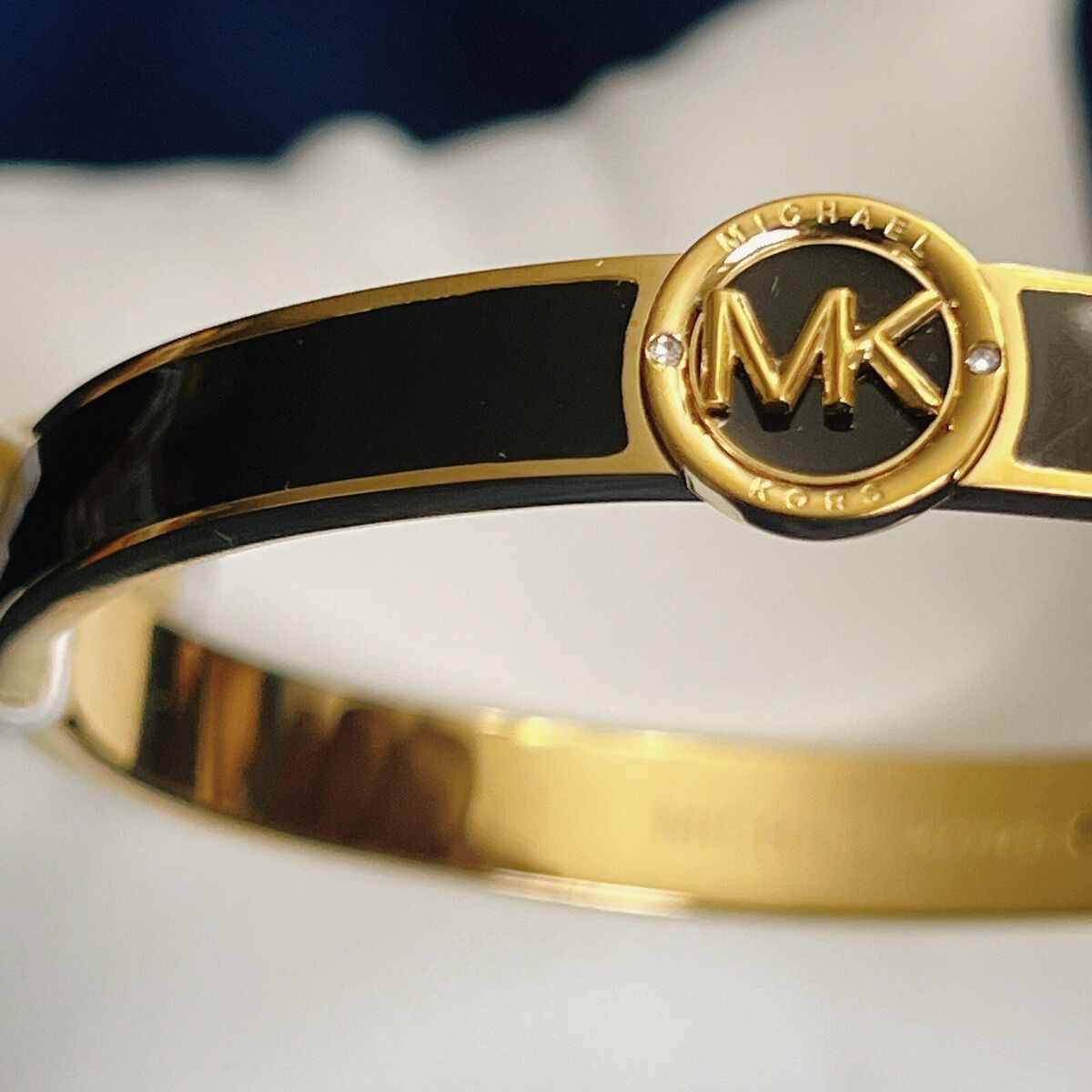 MICHAEL KORS Haute Gold-Tone Black Enamel Logo Bangle Womens MICHAEL KORS Haute Gold-Tone Black Enamel Logo Bangle Womens